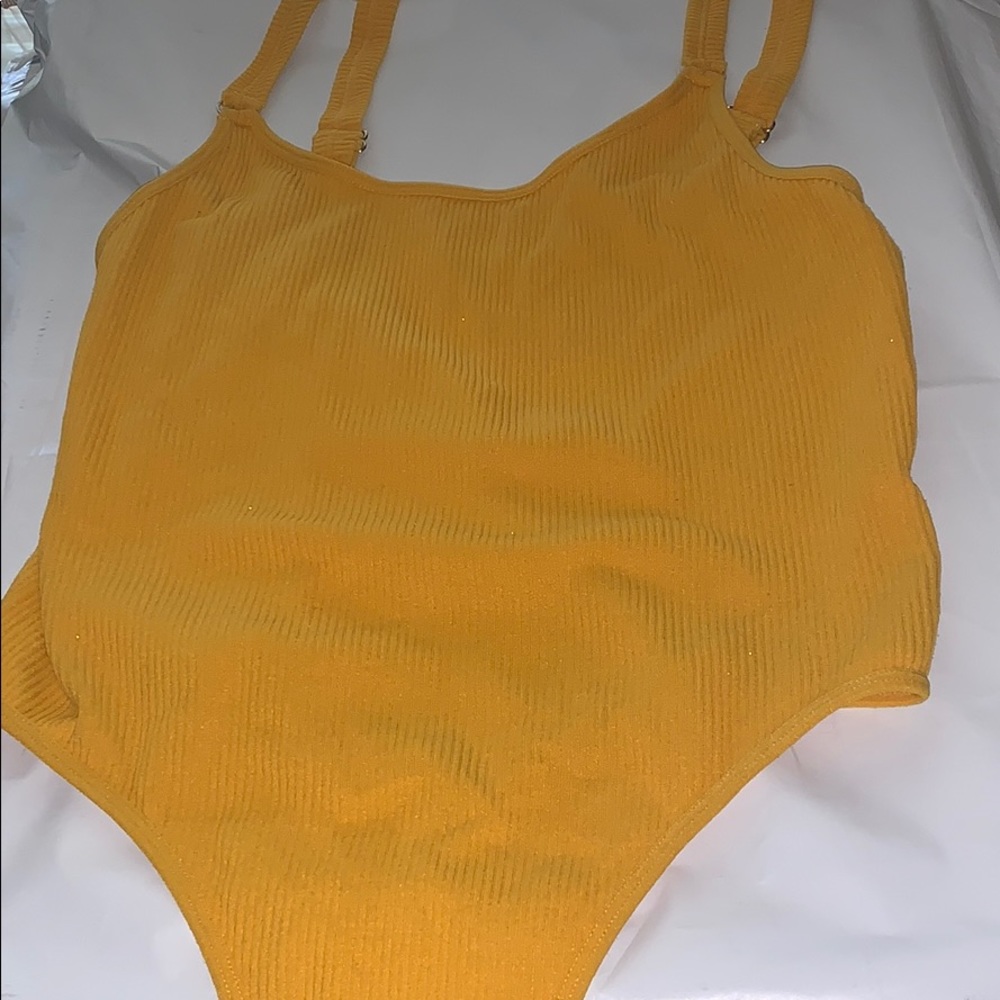 Yellow body suit worn once no rips or tears